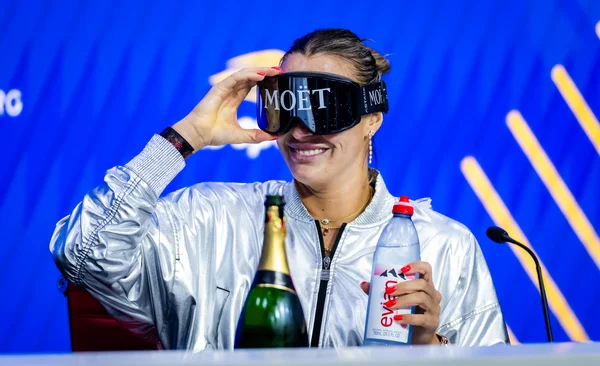 Close up of Aryna Sabalenka showing intense emotion on court.