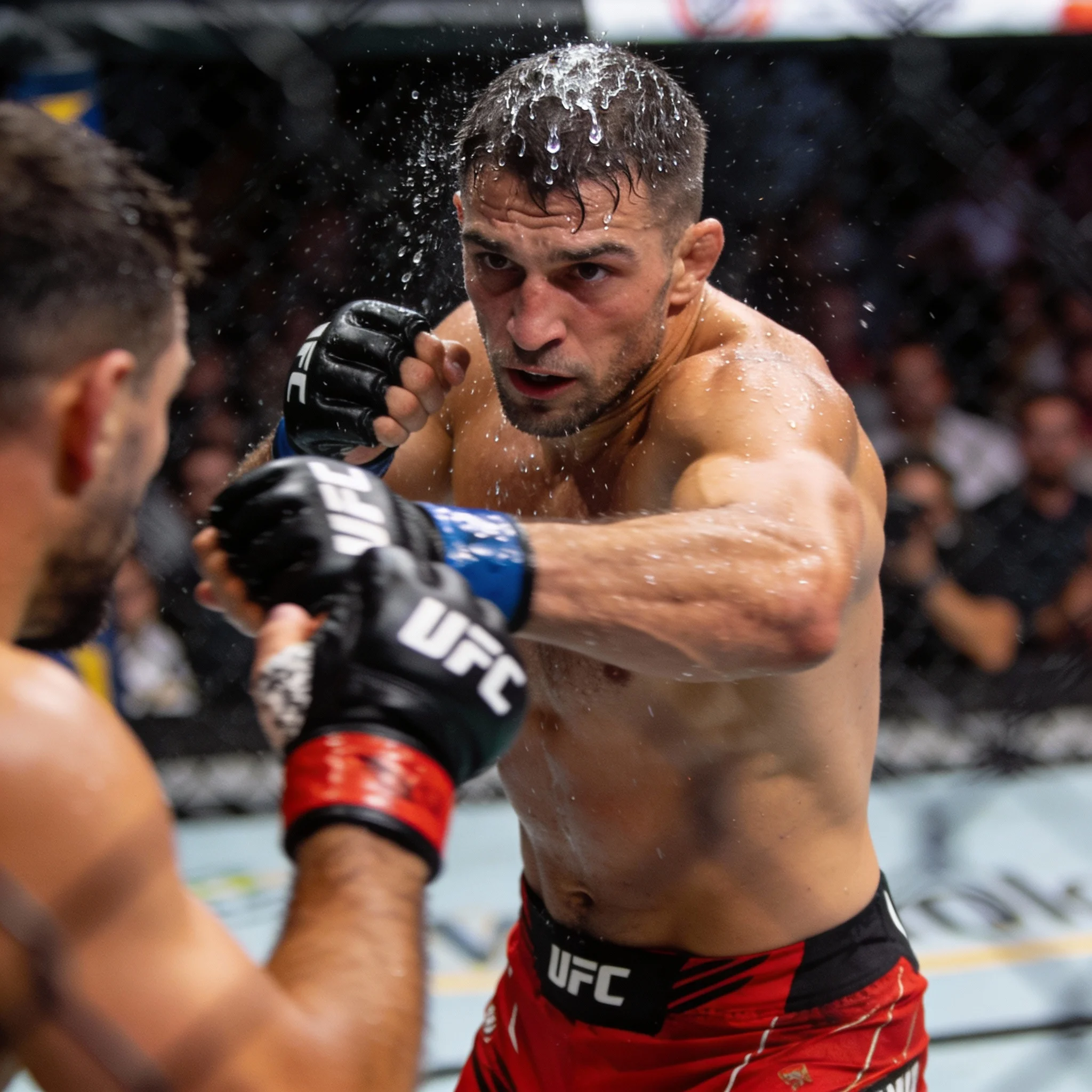 Benoît Saint Denis striking in the UFC Octagon.