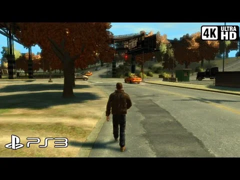 Capture d'écran de gameplay de Grand Theft Auto IV montrant Niko Bellic marchant dans une rue de Liberty City bordée d'arbres d'automne, avec un taxi orange visible. L'image comporte un logo PS3 et un filigrane '4K ULTRA HD'.