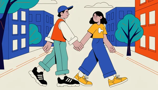 Un jeune couple marche main dans la main dans une rue piétonne, se regardant avec affection et complicité.