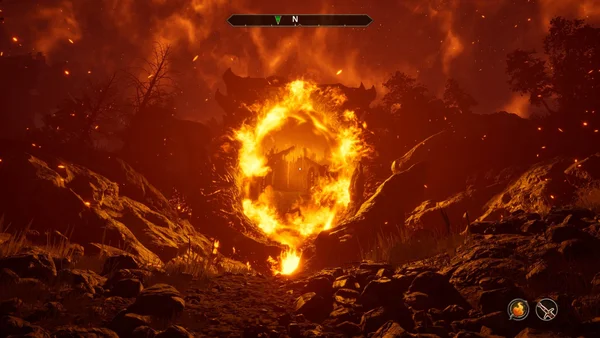 Portail de flammes ovale de l'Oblivion au cœur d'un paysage montagneux dévasté, montrant la qualité visuelle du remaster du jeu original