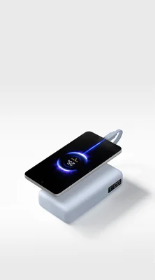 Batterie externe Xiaomi 67W 20000 mAh avec câble intégré, en vue de présentation sur un fond neutre.