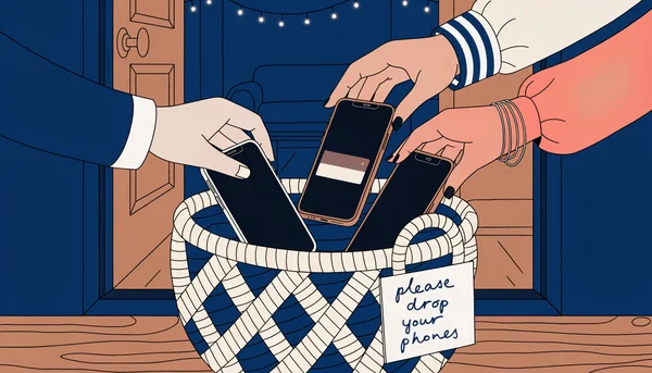 Trois paires de mains déposant simultanément des smartphones dans un panier tressé posé sur une console à l'entrée d'un appartement, avec un aperçu du salon chaleureusement éclairé en arrière-plan. Illustration en aplats de couleurs montrant le rituel convivial du "parking à téléphones".
