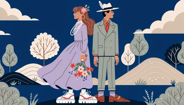 Une mariée dans une robe fluide couleur lavande et un marié dans un costume sage vert sur mesure, posant de profil devant des collines campagne, illustrant les choix vestimentaires personnels et colorés des mariages 2027.