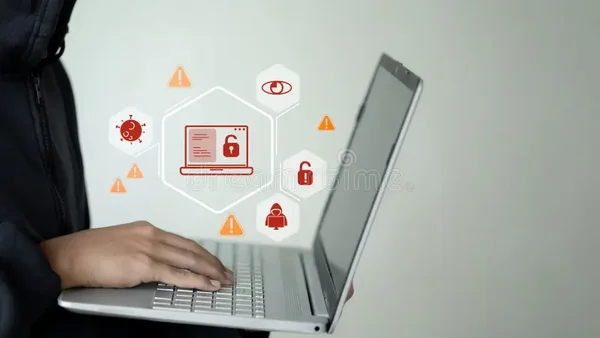 Une personne en hoodie sombre tape sur un ordinateur portable, des icônes numériques représentant des menaces de cybersécurité flottant au-dessus du clavier