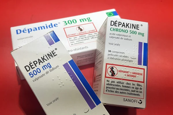 Visuel associé à la Dépakine et au contentieux judiciaire opposant des patients à Sanofi.
