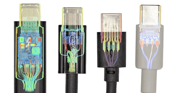 Quatre câbles de recharge USB alignés côte à côte, chacun avec un rendu radiographique révélant le câblage et les circuits internes ; le deuxième câble est de marque Amazon Basics.